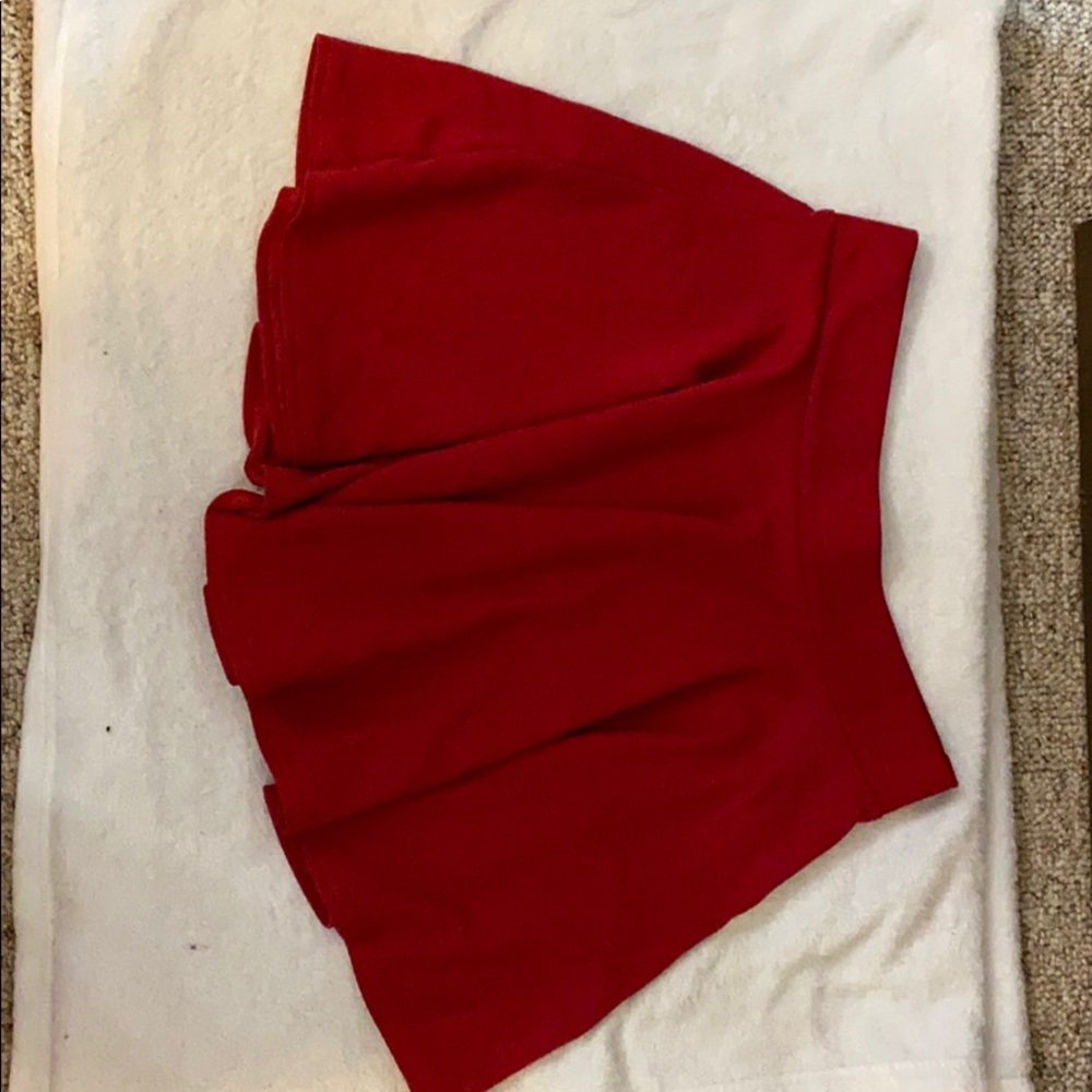 Red pleated skater skirt